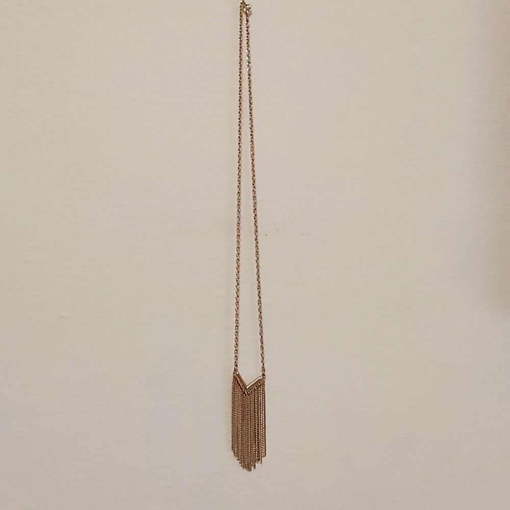 Gold Tier Necklace. Costume jewelry. Gold is coming back!